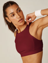 red high-neck powerbeyond bra.
